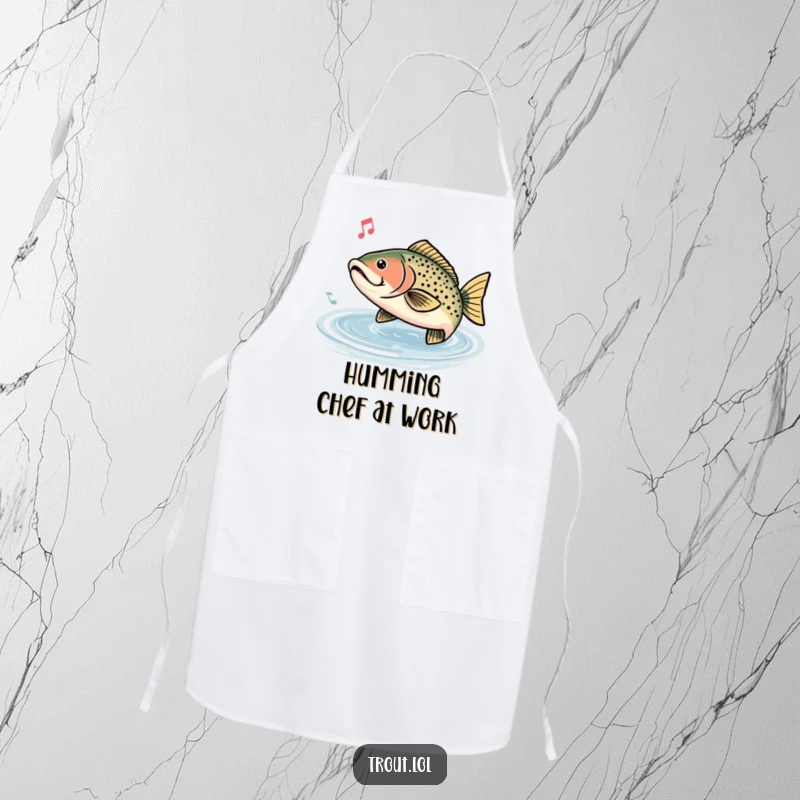 Funny apron showcasing a trout humming a happy tune, with musical notes in the water, perfect for any kitchen.