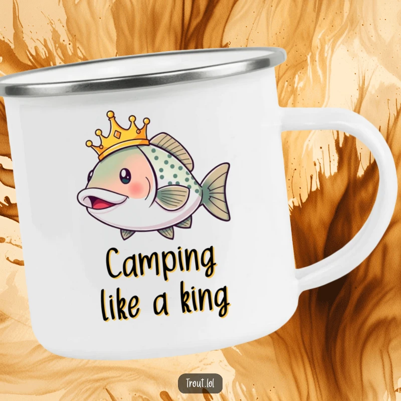 Funny camping mug showing a smiling trout wearing a crown, swimming regally, ready for outdoor adventures and coffee.