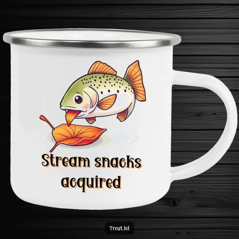 Funny trout leaf camping mug featuring an enthusiastic trout nibbling on a colorful drifting leaf, great for outdoor fun.