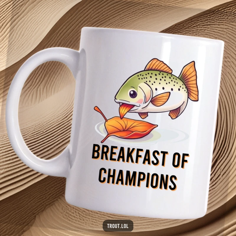 Funny nibbling trout mug featuring an enthusiastic trout happily munching on a colorful drifting leaf.