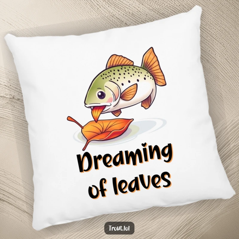 Funny trout leaf pillow featuring an enthusiastic trout nibbling on a colorful drifting leaf, perfect for comfort.