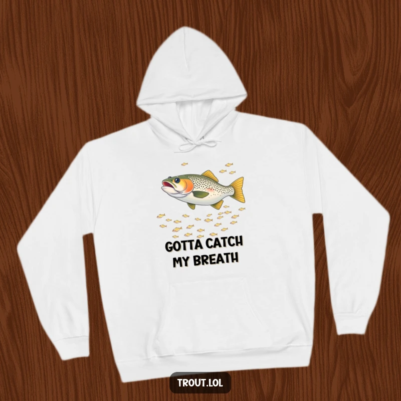 Funny hoodie depicting a trout playfully chasing a school of tiny shimmering fish, creating a scene of dynamic underwater action.