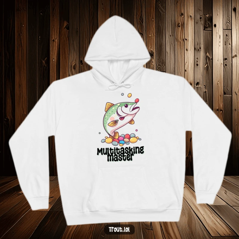Funny hoodie showcasing a trout expertly juggling colorful pebbles with its fins, celebrating skill and playful amusement.