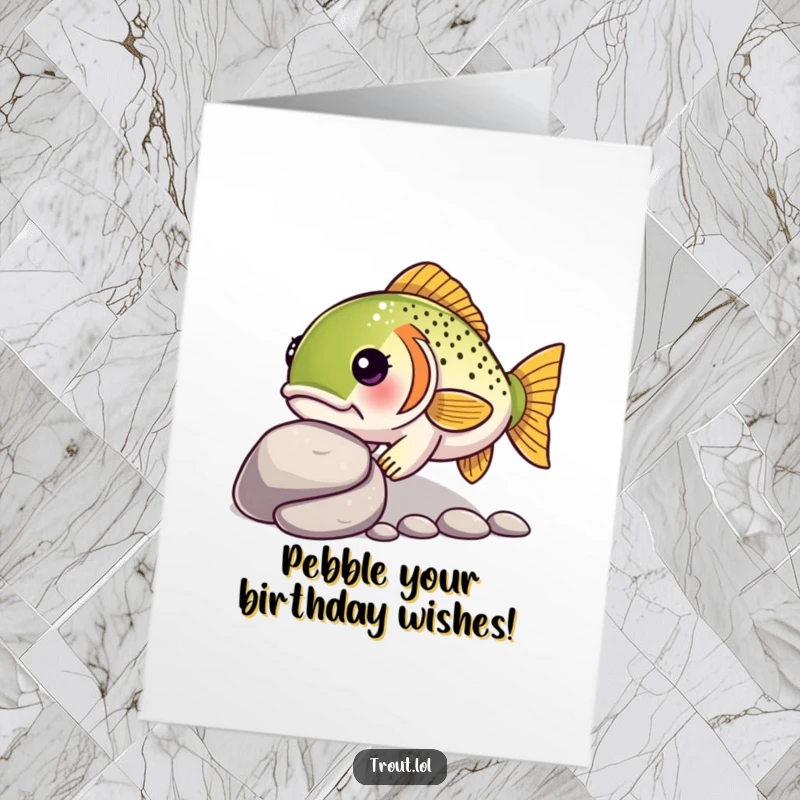 Funny Free Printable Birthday Card: a kawaii trout with a determined look nudges a smooth pebble, symbolizing focus and achievement.