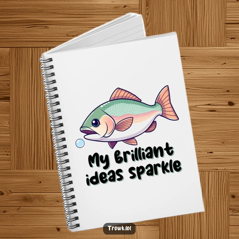 Funny notebook with a design of a trout with sparkly scales playfully chasing a bubble, inspiring creativity.