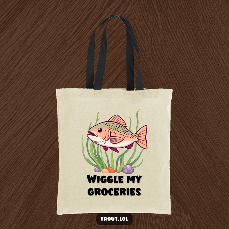 Funny tote bag depicting a trout doing a happy wiggle as it swims past seaweed, showcasing underwater fun.